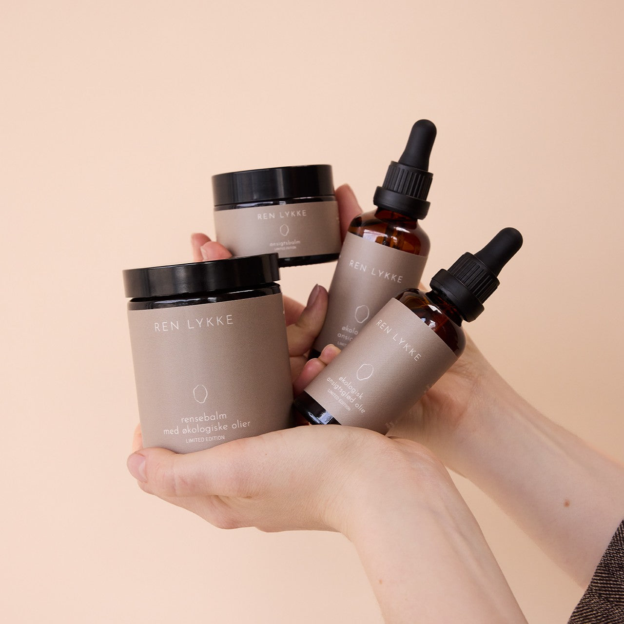 Limited edition hudplejesæt med rensebalm, ansigtsbalm og ansigtsolier fra REN LYKKE